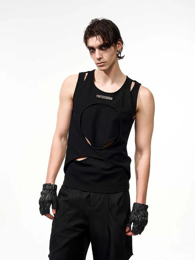Men's loose fit sleeveless vest in black and white colours, showing round neck and pullover design