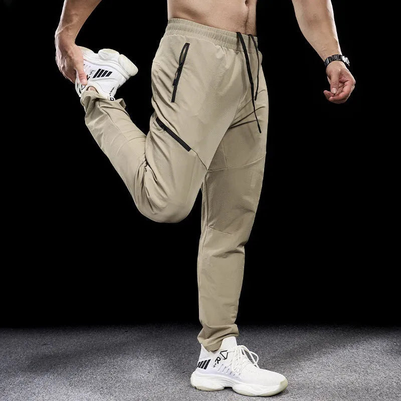 Men's waterproof quick-drying exercise pants in nylon fabric for sports and fitness activities