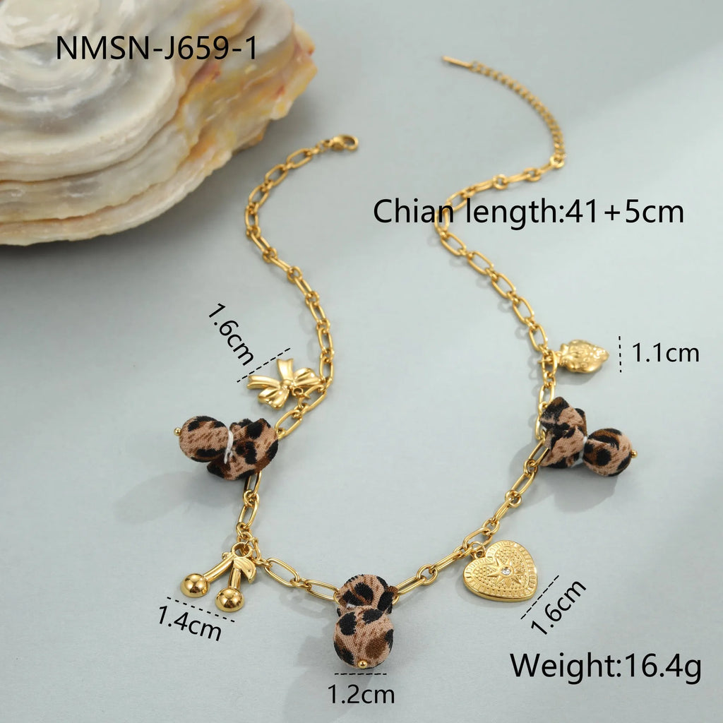 Gold-coloured stainless steel necklace with leopard pattern pendant on adjustable 41-50cm chain