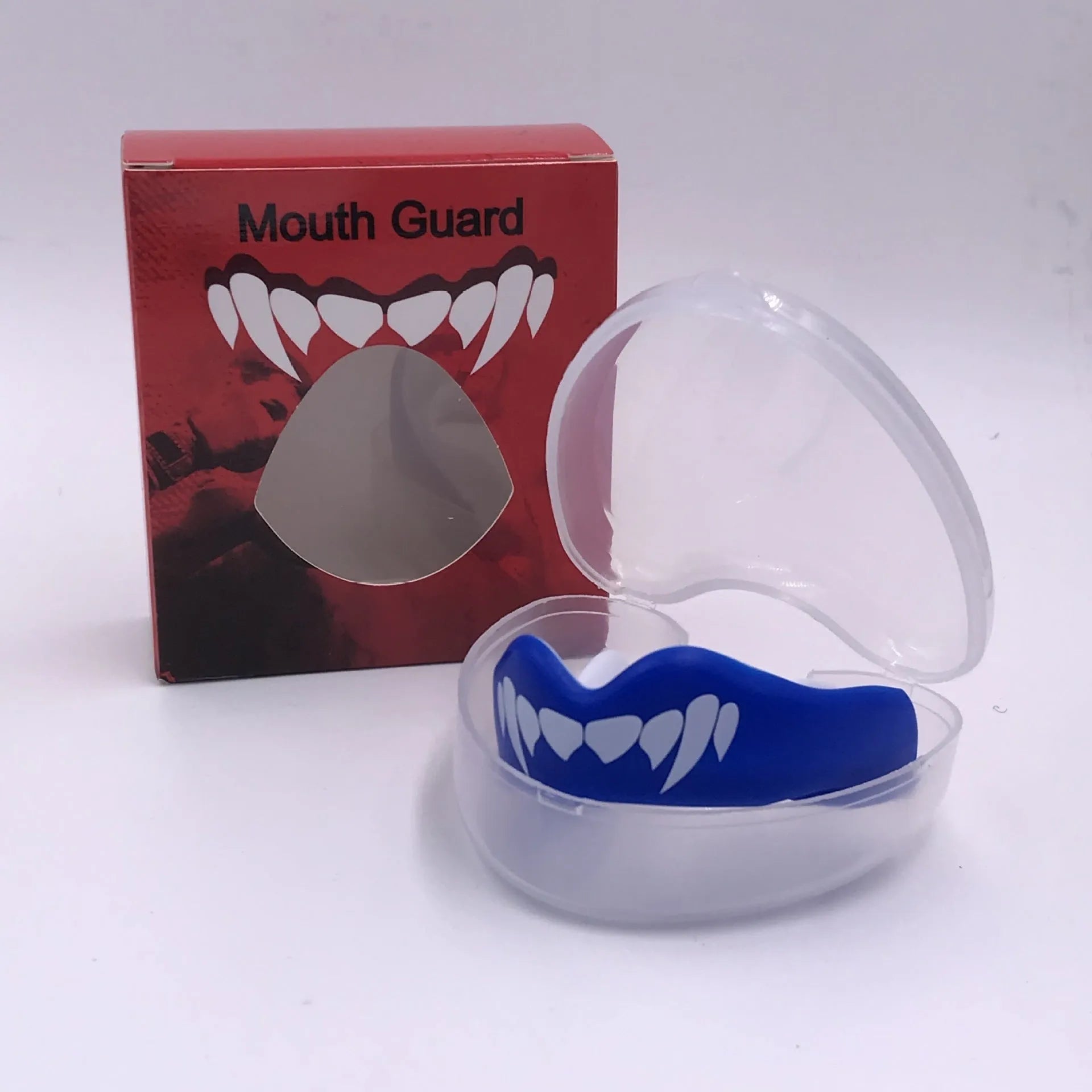Adult boxing sports mouthguard with printed teeth design in black and white colour.