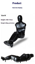 Black patent leather adult restraint harness with full body wrap and six ratchet tie-down pieces