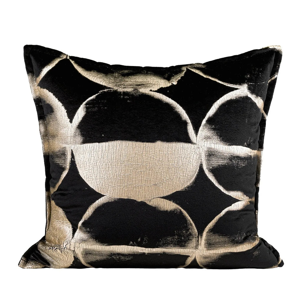 Black gold abstract pattern decorative cushion with removable cover in three size options on a sofa.