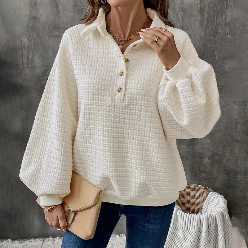 Women's milky white polo collar sweater with long sleeves and textured knit.