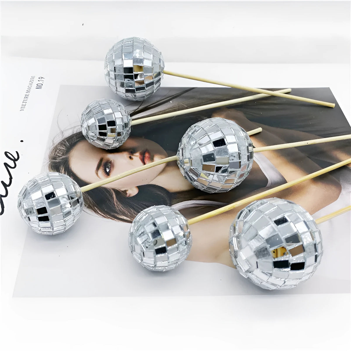 Glass disco ball cake decoration on wooden stick in multiple sizes for birthday cakes