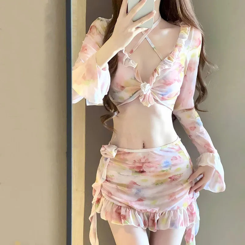 Women's cherry blossom pink floral bikini swimsuit set on a mannequin, showing front and back views.