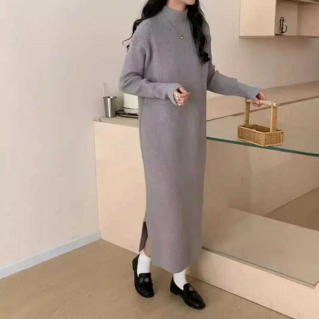 Acrylic half turtleneck knitted dress in graphite colour with high waist and overknee long length