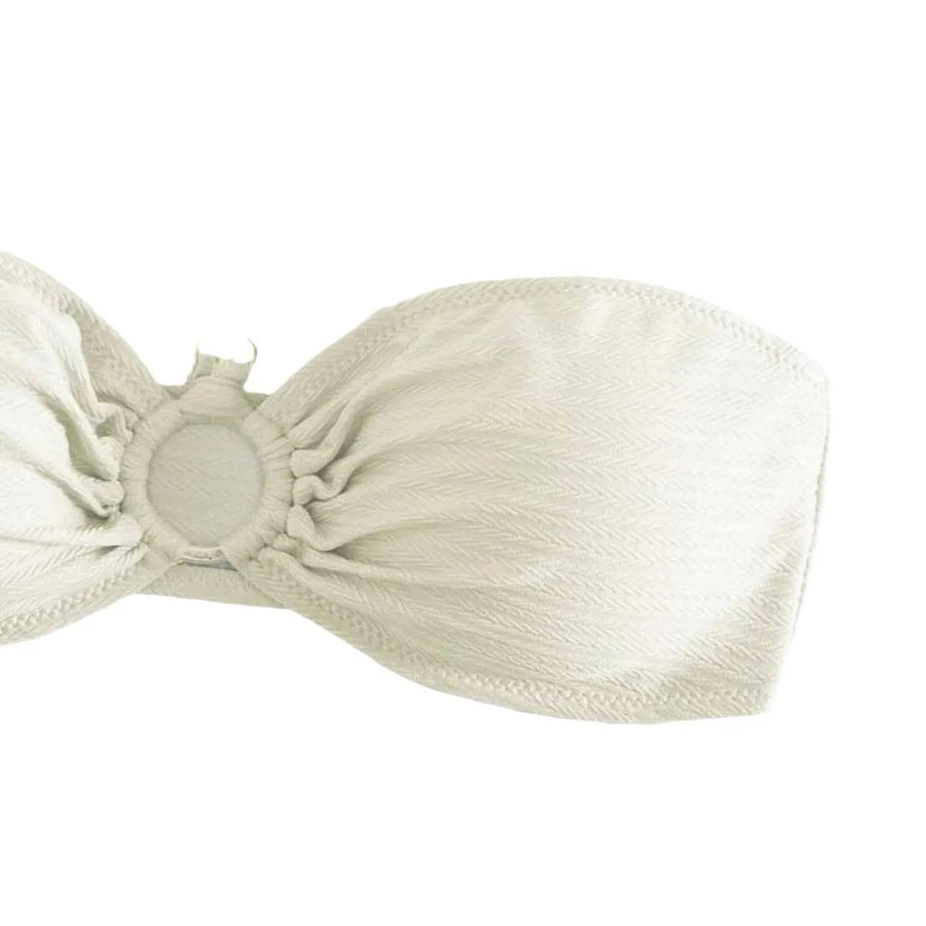 Women's pure colour halter neck bikini set on a hanger, shown in creamy-white.