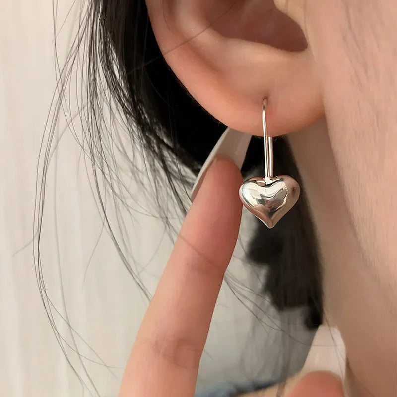 Silver heart-shaped Korean style earrings with 3D glossy finish and copper construction