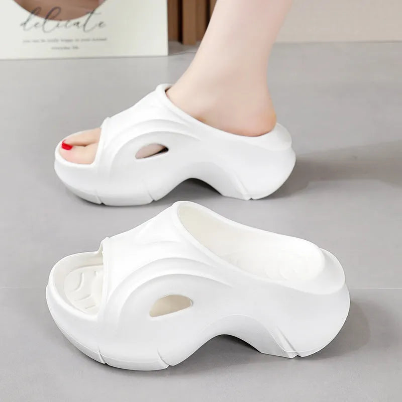 Women's EVA slippers with thick sole in black, rose red or white colours on beach background
