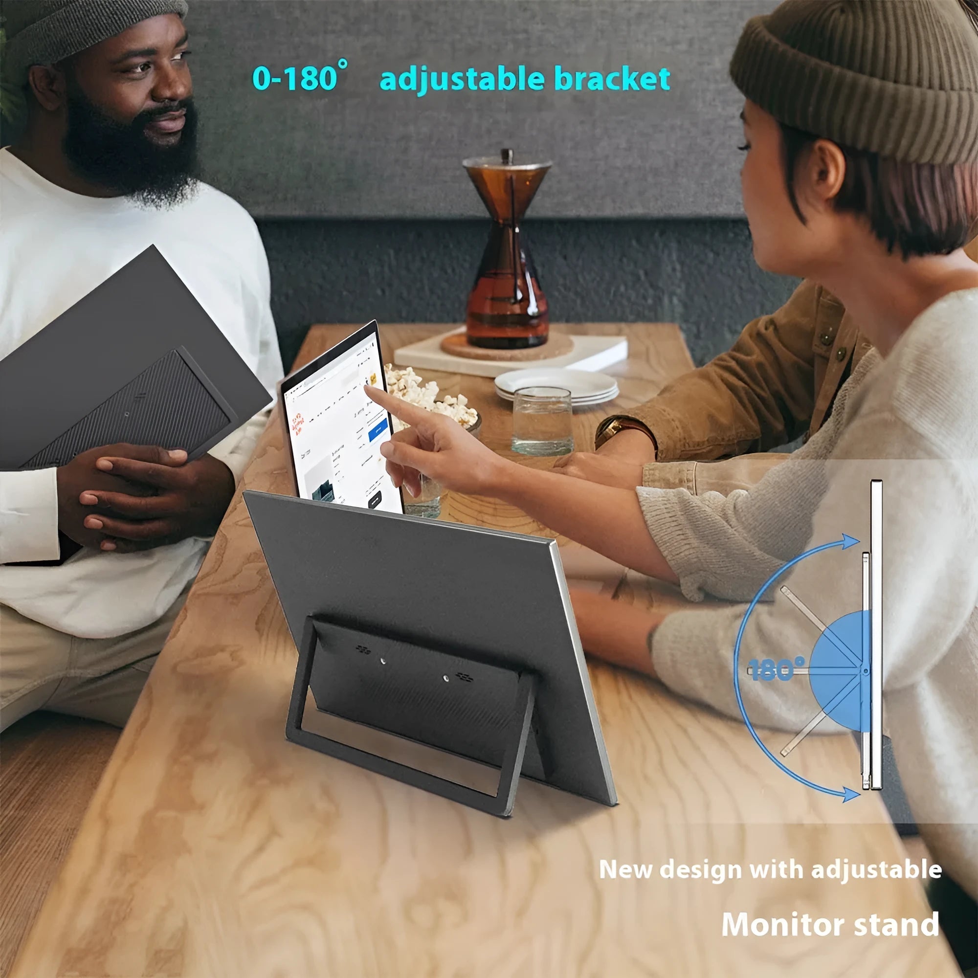 Black 15.6-inch portable computer monitor on an adjustable stand with HDMI and USB cables.