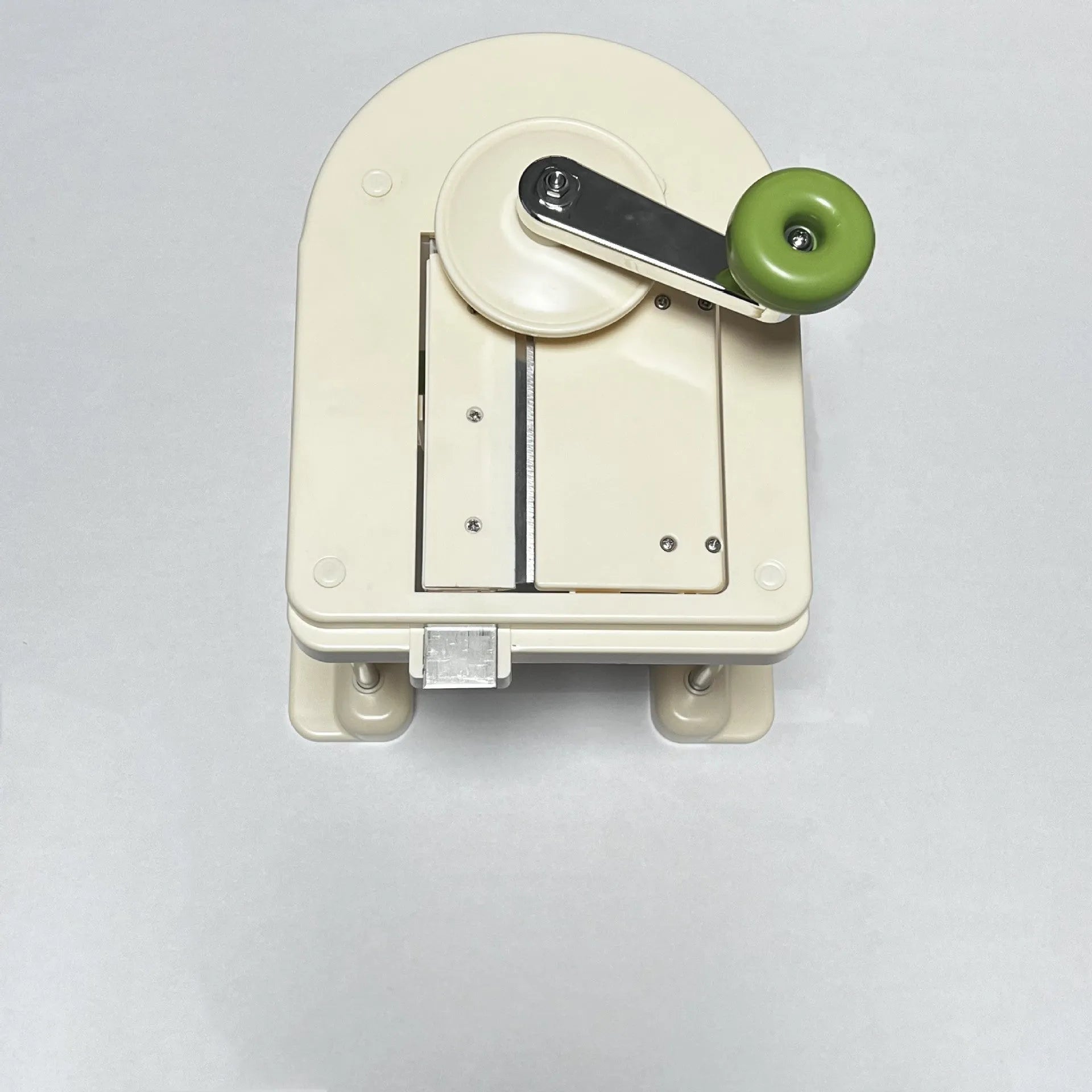 Beige vegetable slicer chopper grater with stainless steel blades for kitchen use