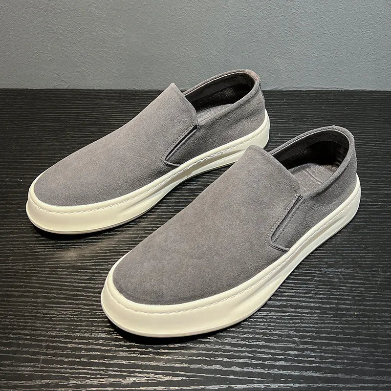 Men's slip-on casual shoes in apricot with round toe, sewing detail, and a mid-height rubber sole.