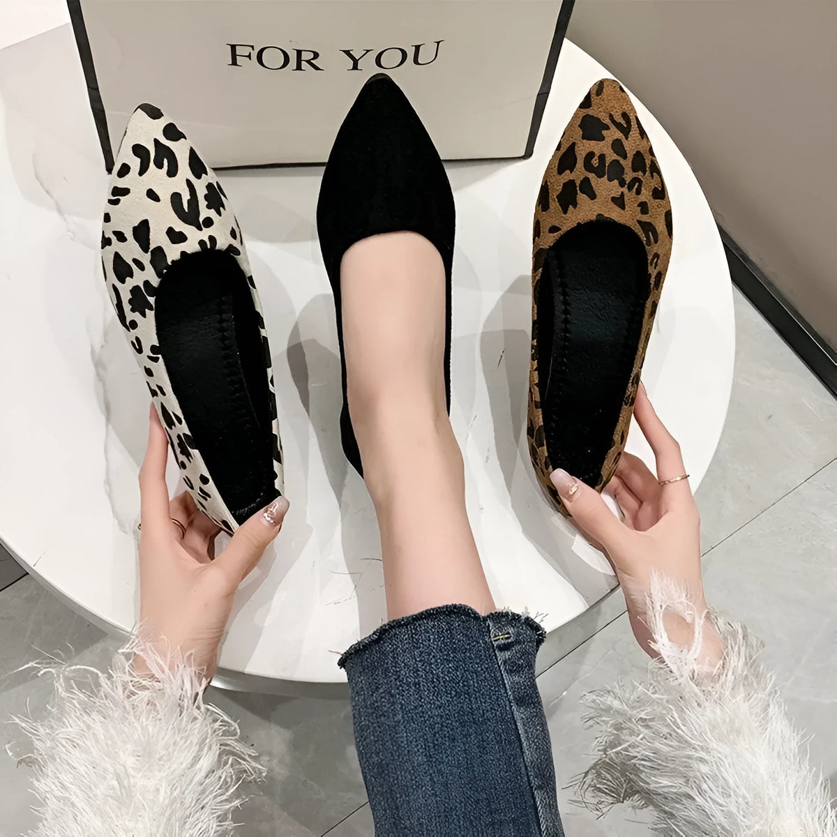Women's leopard print flat pumps with pointed toe design and low heel