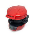 Bright red breakfast sandwich maker with egg cooker ring and waffle plates on kitchen counter