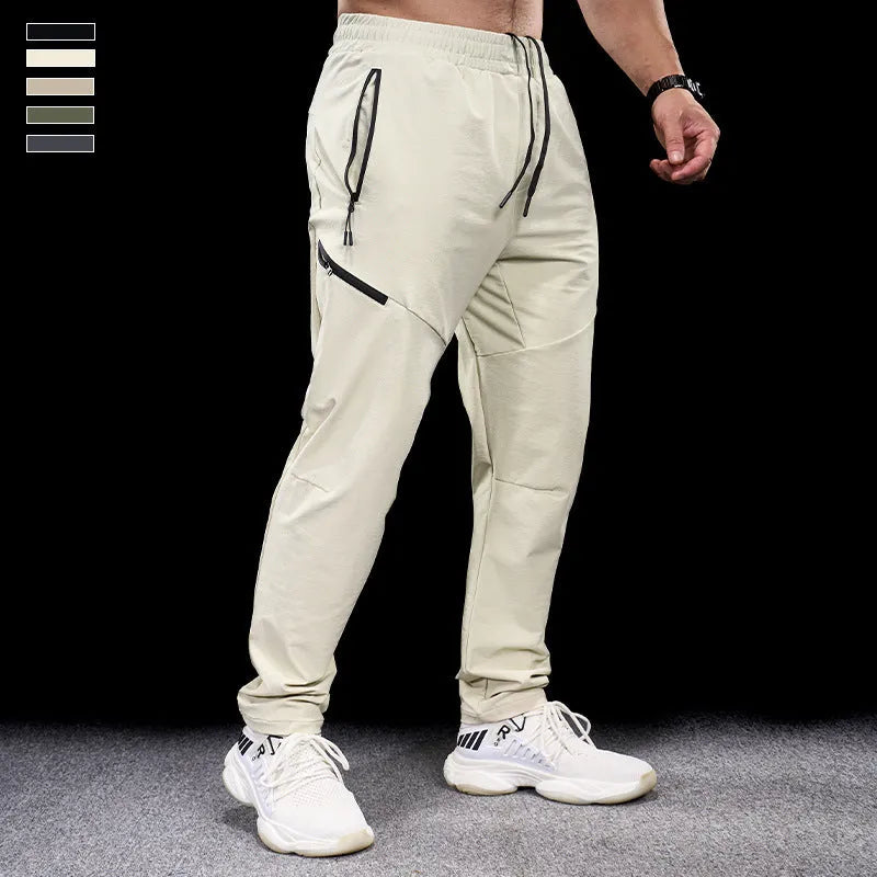 Men's waterproof quick-drying exercise pants in nylon fabric for sports and fitness activities