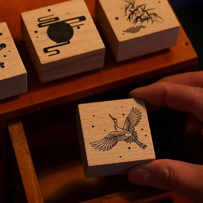 Mr Paper wooden seal set showing handcrafted stamp with crane design for DIY printing projects