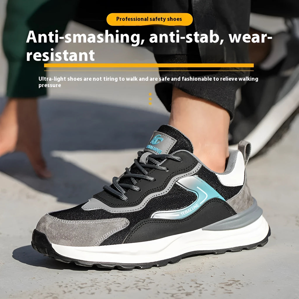 Men's low-top grey work shoes with shoelaces, featuring a plastic steel toe and a mesh and leather upper.