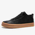 Men's black leather casual shoes with round toe and lace-up closure on rubber soles