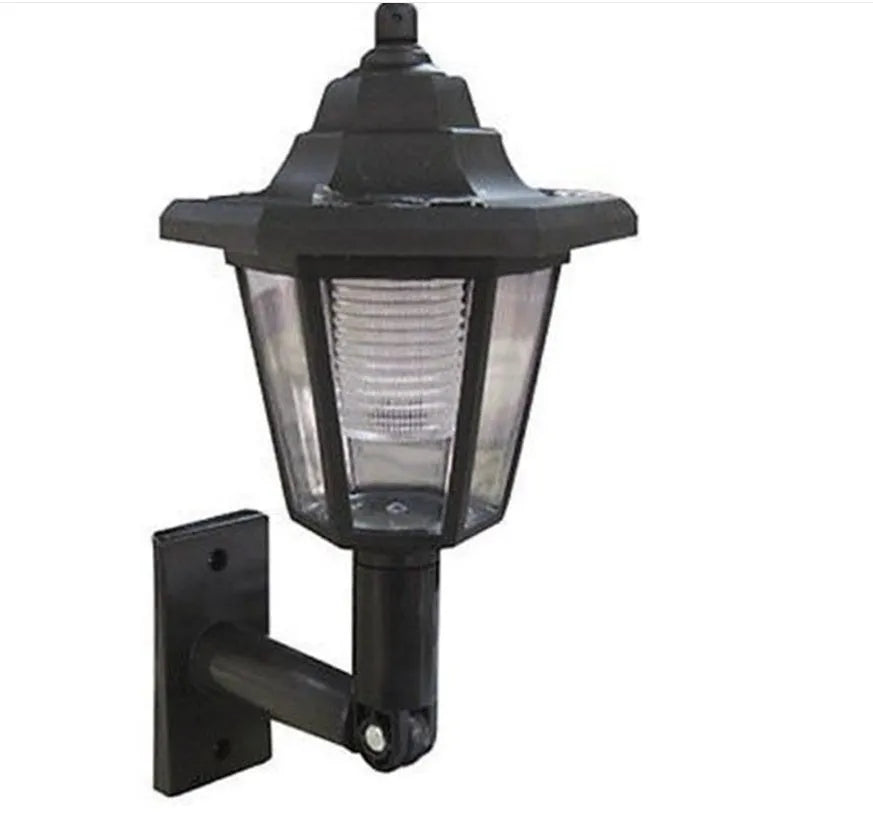 Black hexagonal solar-powered LED wall light for outdoor garden and security lighting