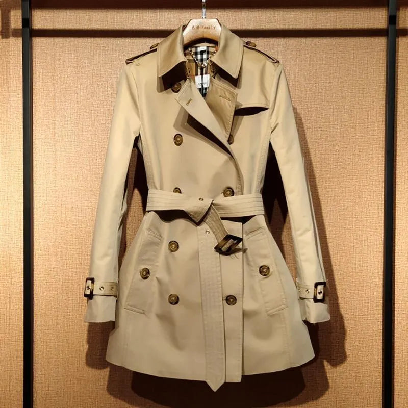 Khaki women's double breasted trench coat with flight sleeves showing button detailing