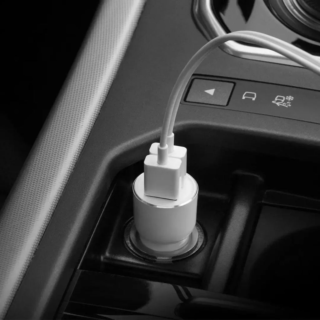 Black Ruimi 3S Music Bluetooth car charger for mobile phone and tablet charging.