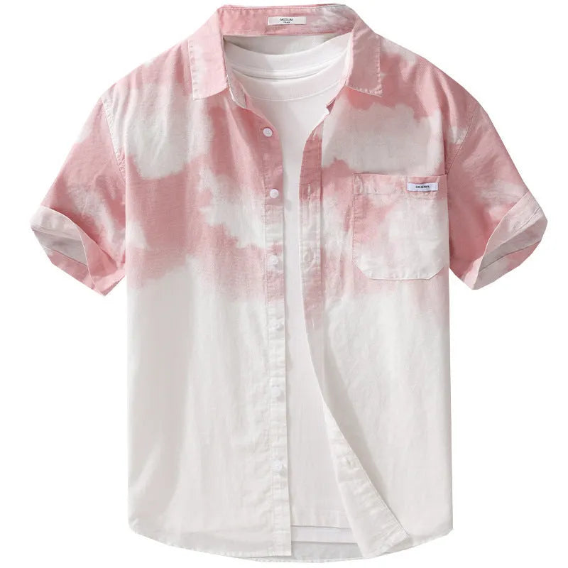 Man wearing a light pink loose-fit short-sleeved cotton cardigan style shirt.