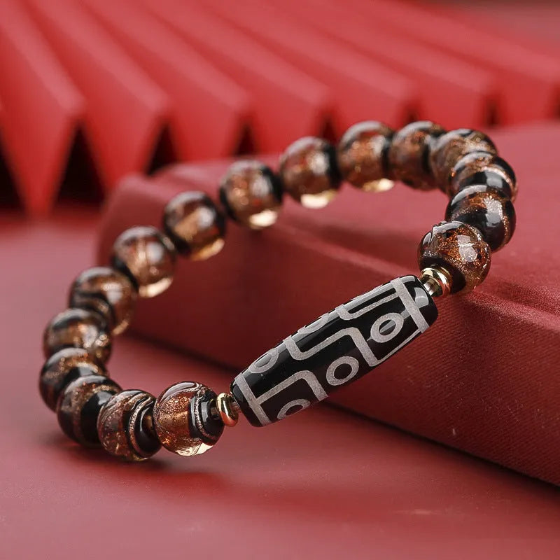 Handcrafted coloured glaze bracelet with Chinese auspicious patterns and snake beads in 10mm, 12mm, or 14mm sizes.