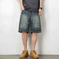 Blue retro distressed denim men's shorts with loose hole detailing and straight cut