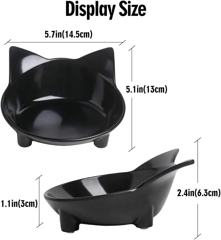 Shallow black melamine pet bowl with a non-slip rubber base on a kitchen floor.