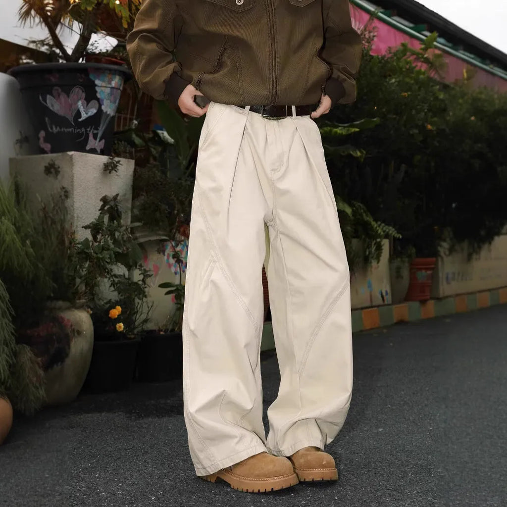 Men's loose straight leg trousers with pleats and stripes in apricot, black, and brown colours