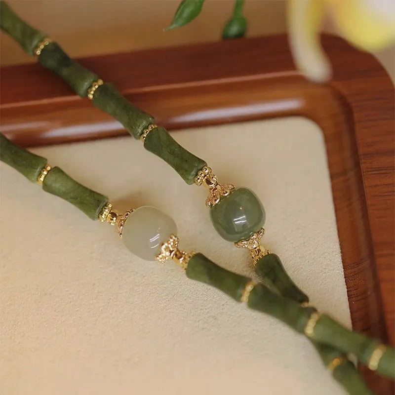 Geometric Hetian jade bracelet for women in dark green or light colour with round design elements