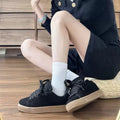 Retro black low-top sneakers with English muffin heel and waterproof platform design