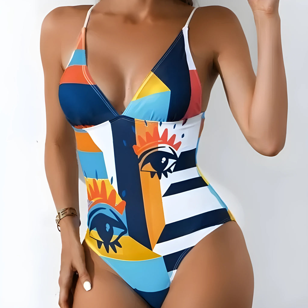 Women's plus size printed bikini swimsuit in solid blue, purple, green, or pink colours with backless design