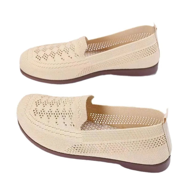 Beige low-top mesh casual trainers for women with a round toe and flat PVC sole.