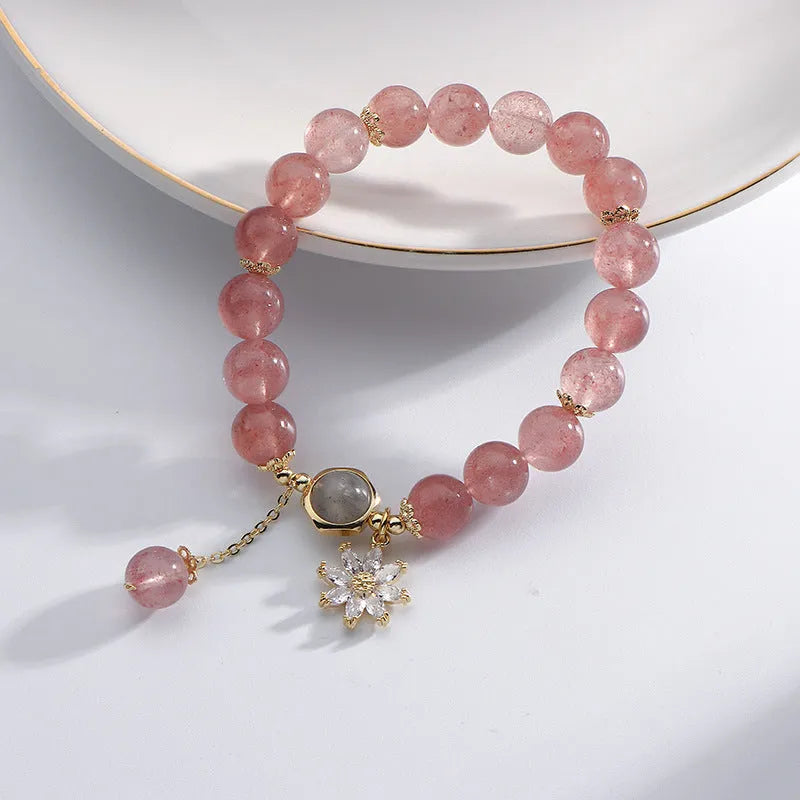 Strawberry quartz crystal bracelet with electroplated flower pendant in Mori style design