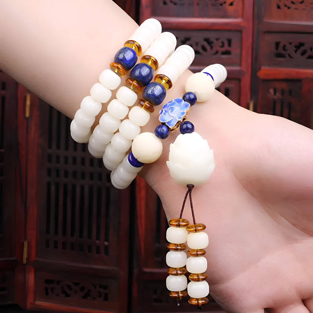 White jade Bodhi bead bracelet with 6x8mm beads in various decorative styles