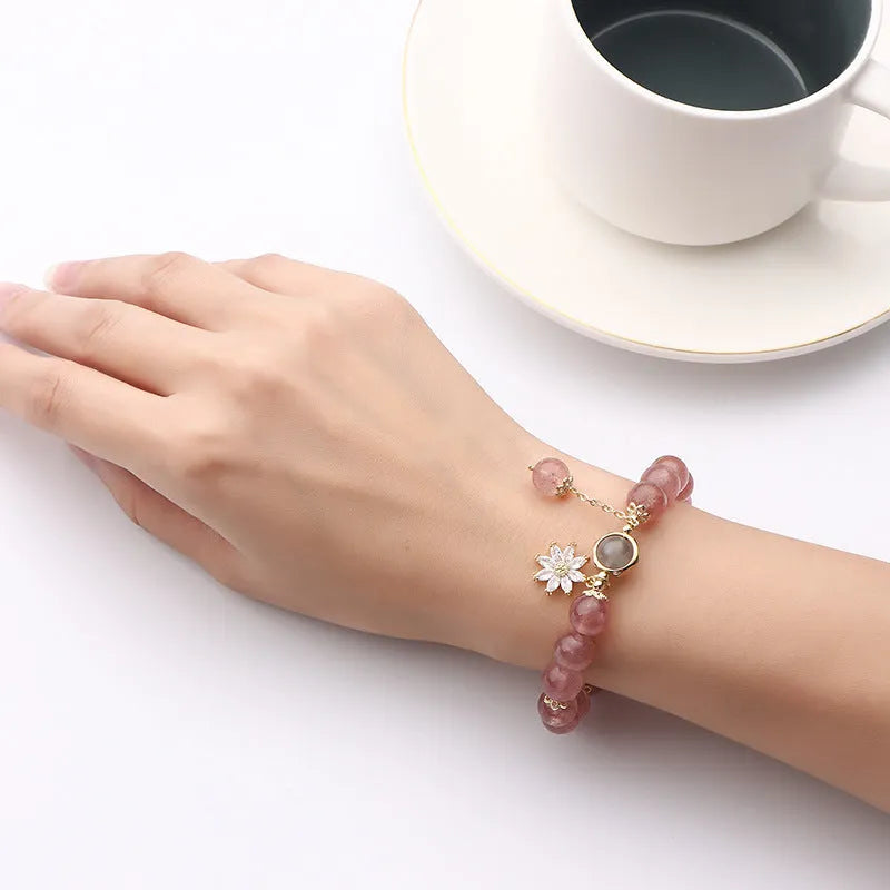 Strawberry quartz crystal bracelet with electroplated flower pendant in Mori style design