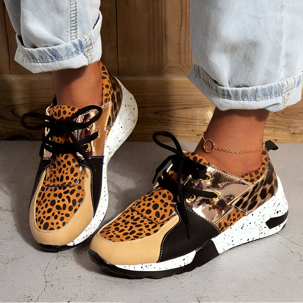 Women's casual suede sneakers with wedge heel in various colours and patterns.