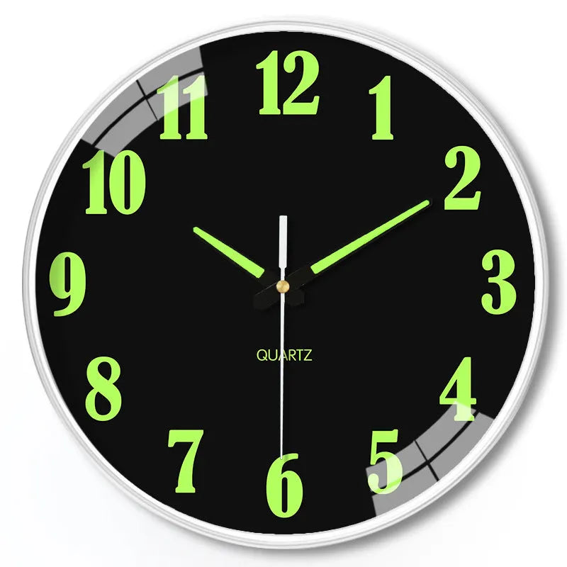 Modern 8-inch luminous wall clock with white plastic case on a wall.