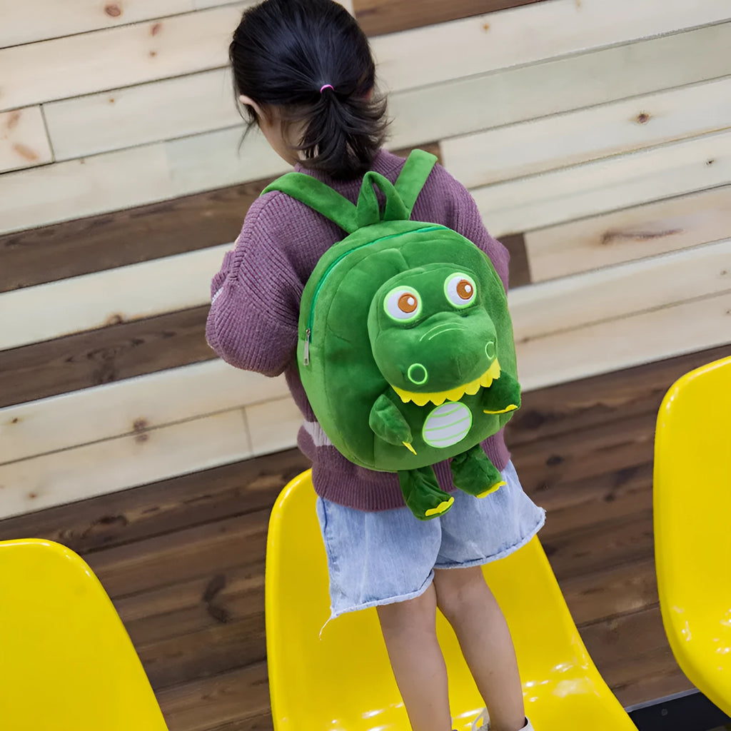Blue dinosaur plush backpack for children with embroidered character and soft handle