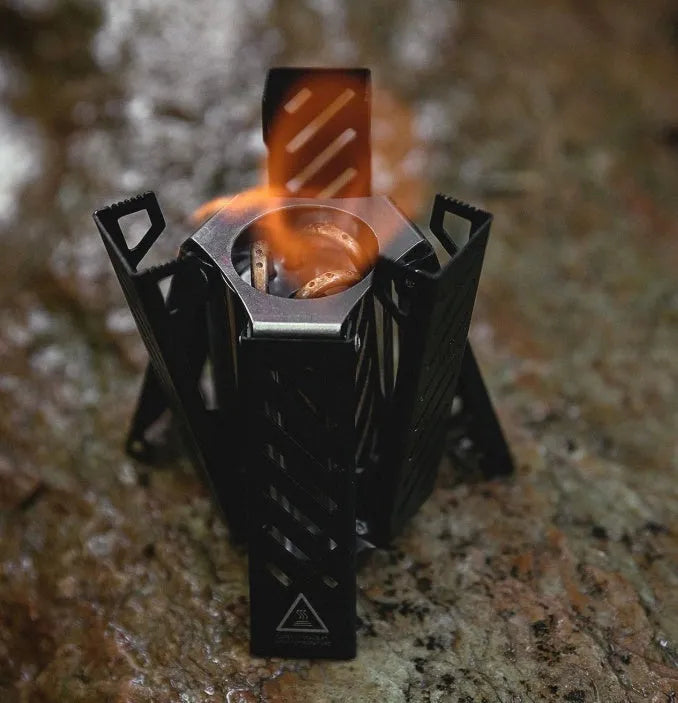 Mini hexagon alcohol stove in black or silver colour, foldable design for camping