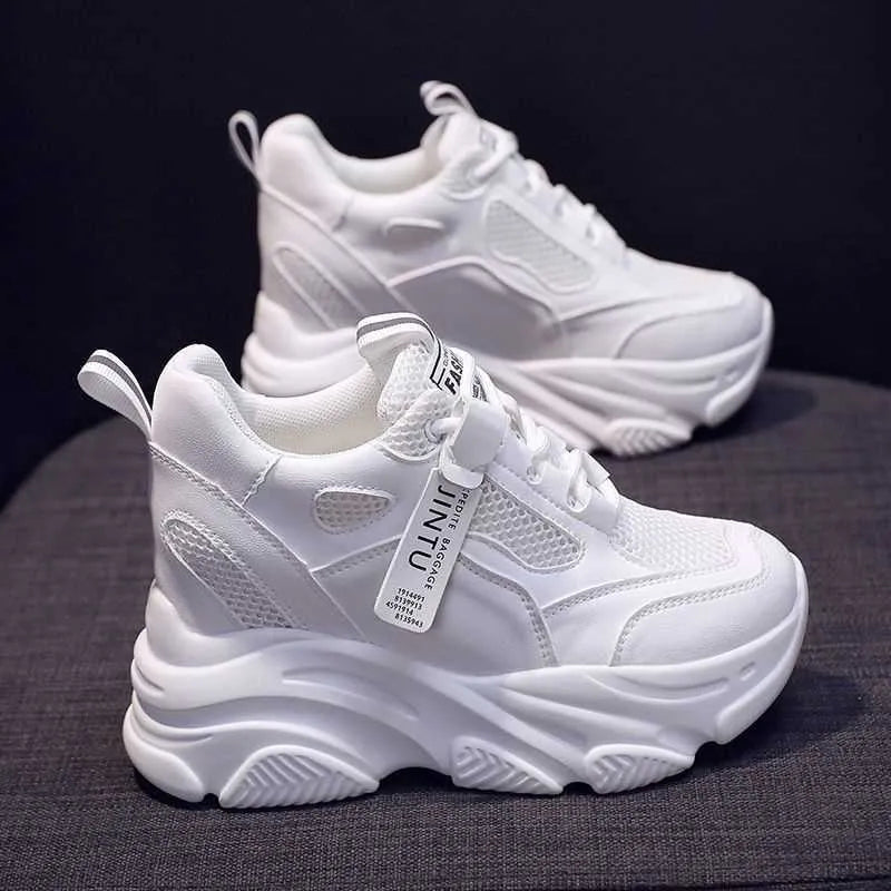 Women's black mesh platform casual shoes with hollow-out design and a toe holder on a white background.