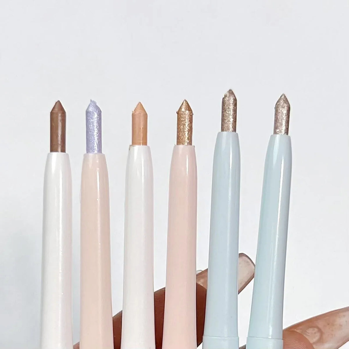 2-in-1 waterproof highlight eyeliner pen in 15 colours including beige pink gold purple