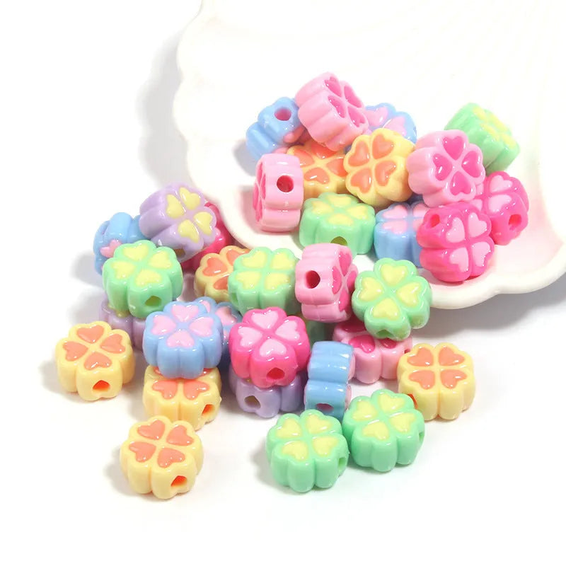 15mm acrylic clover beads with cartoon love pattern and frosted finish in mixed colours