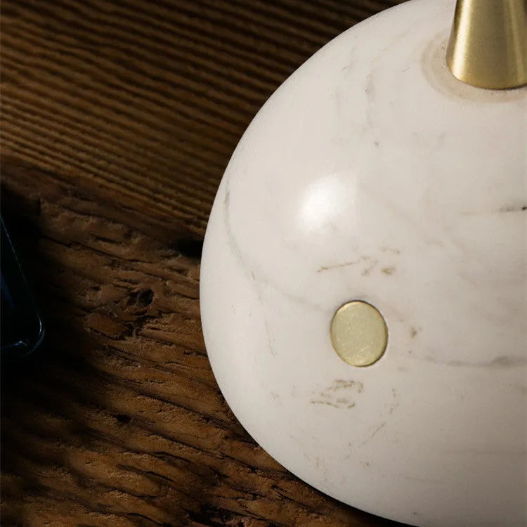 Clear glass desk lamp with touch dimmer and LED light on a wooden table