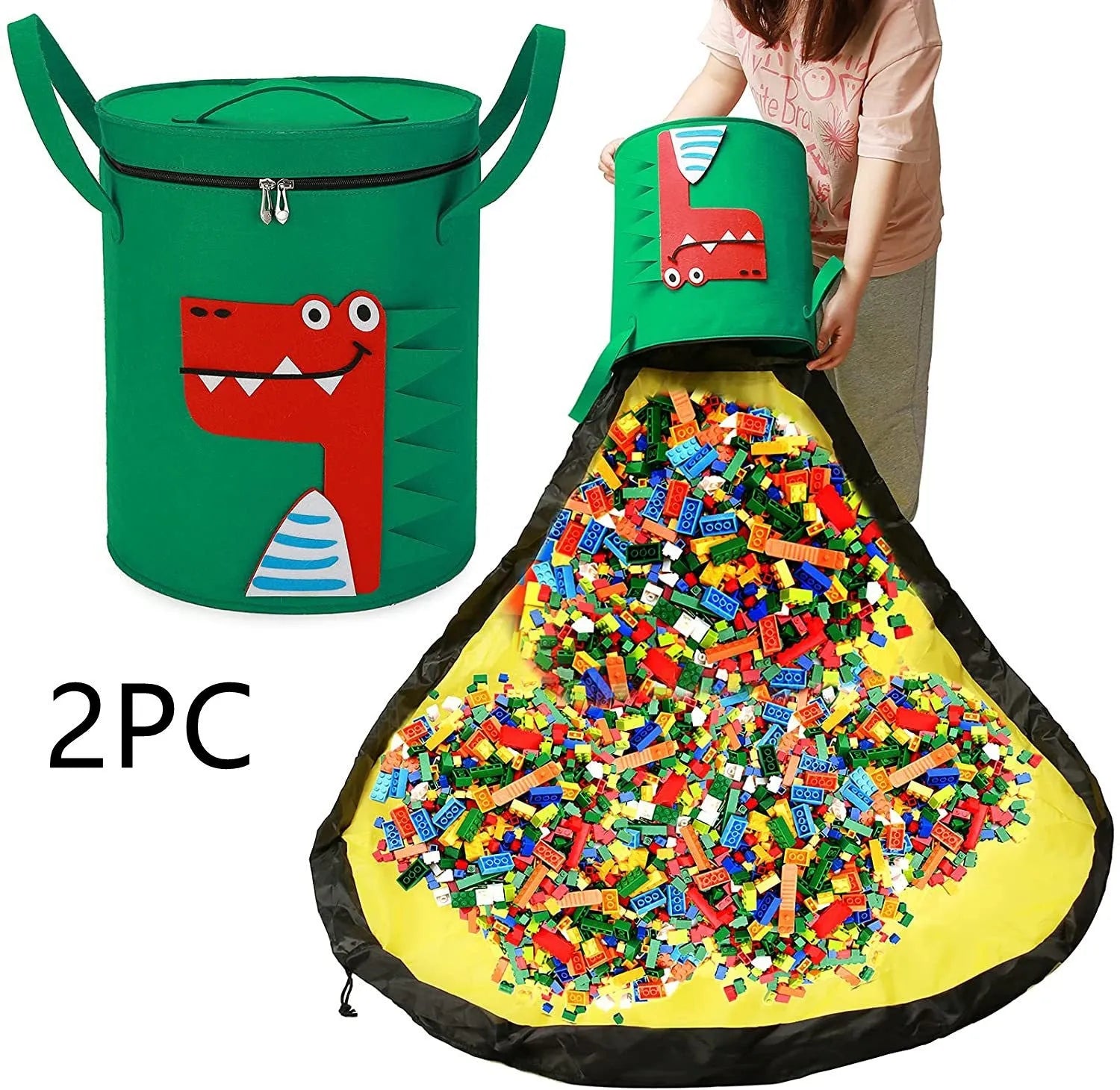 Green cube-shaped felt storage bag with pull rope, laid flat as a play mat.