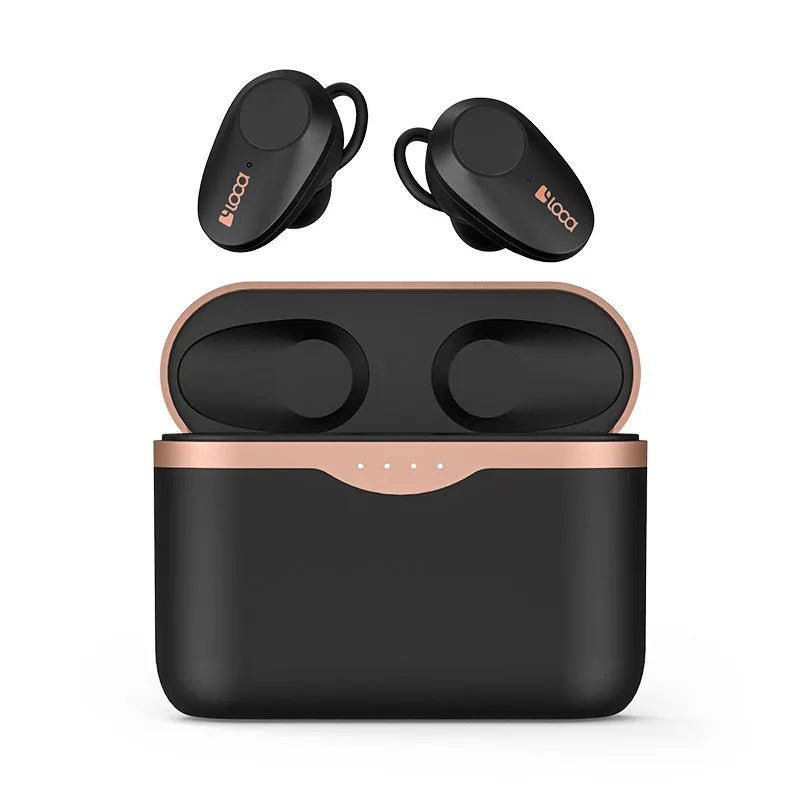 Black wireless Bluetooth headset with charging stand on a table.