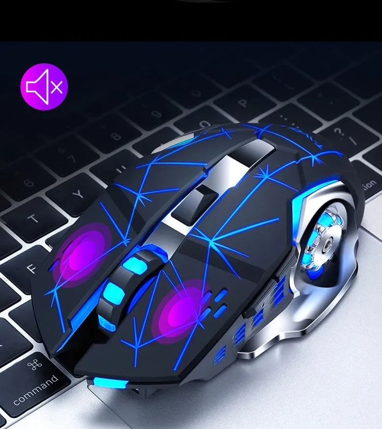 Black and white wireless charging silent computer mouse on a desk next to a laptop