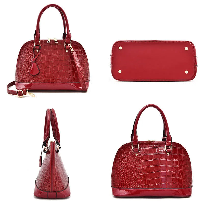 Glossy PU leather crossbody shoulder bag in shell shape with structured design