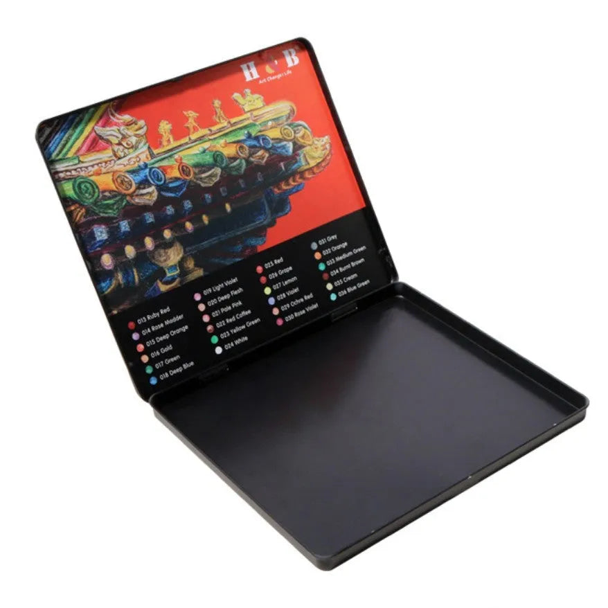 Water-soluble coloured pencils set with 24 colours in metal storage tin for drawing and watercolour techniques